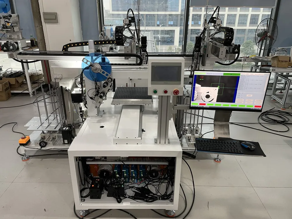 Vision-Aligned Tape Applicator with Auto Loading & Unloading — Vision-aligned tape applicator with camera monitor