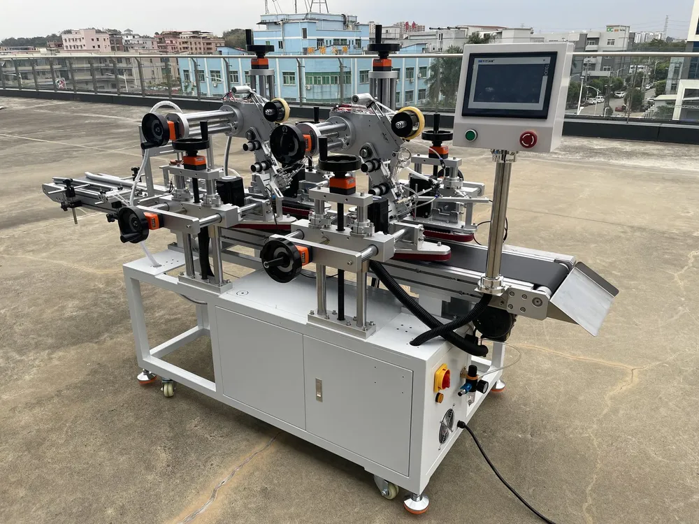 Clamping-Belt Dual-Head Tape Applicator — Clamping-belt dual-head tape applicator with its touchscreen
