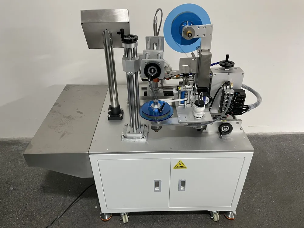 Square Box Tape Applicator — Tape head on its height-adjustable column