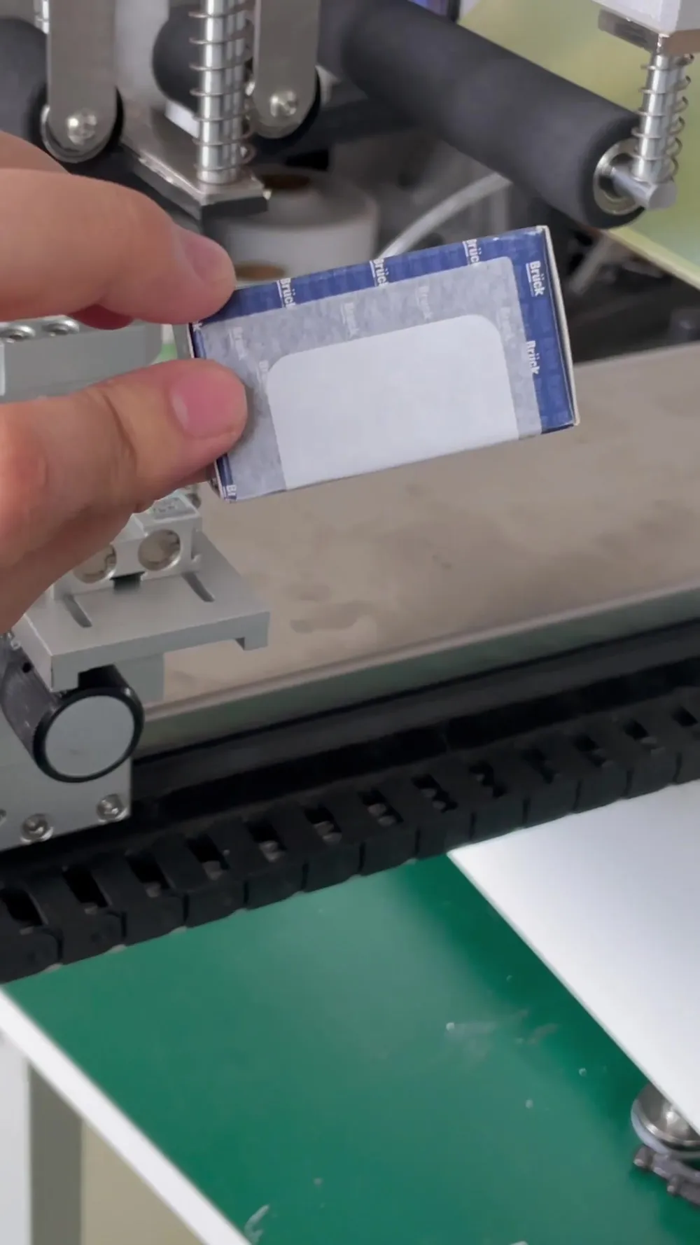 Semi-Automatic Roll-On + Rotary Multi-Face Labeling Machine — Similar configuration — factory demo still