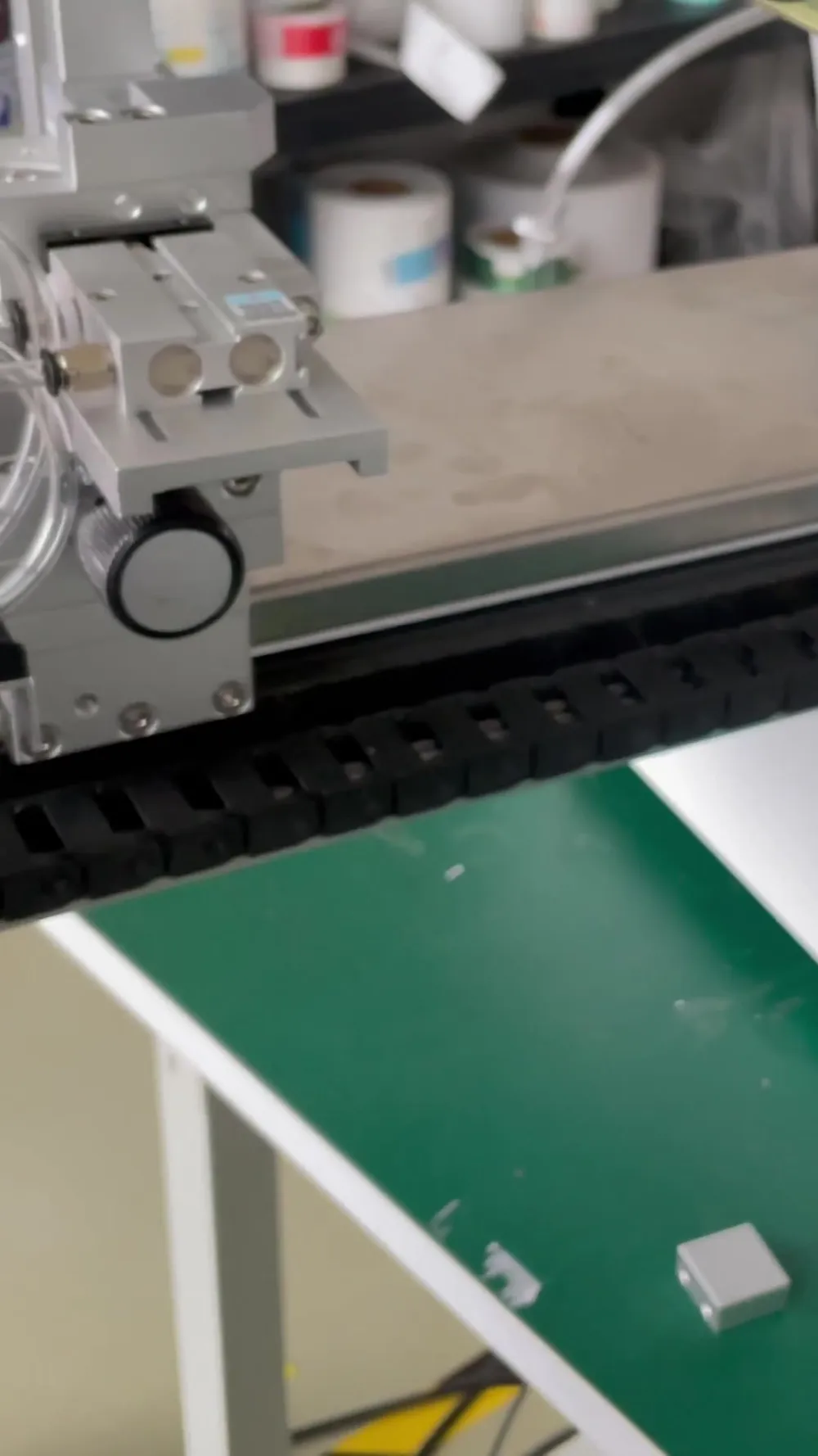 Semi-Automatic Roll-On + Rotary Multi-Face Labeling Machine — Similar configuration — factory demo still