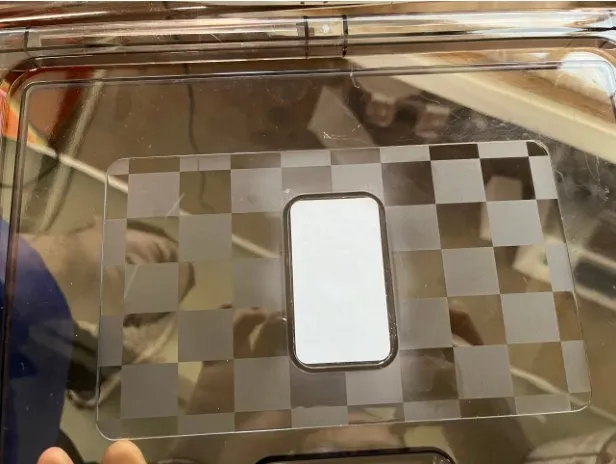 Semi-Automatic Flat Surface Labeling Machine — Label applied on a clear sheet