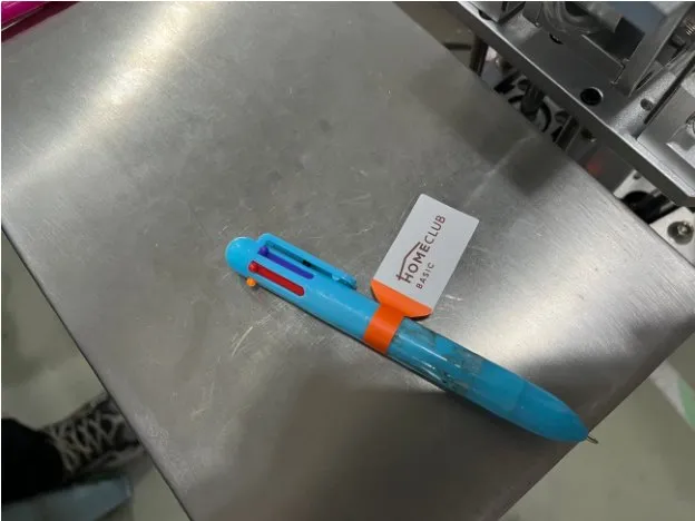 Semi-Automatic Fold-Over (Flag) Labeling Machine for Cables — Pen with a fold-over flag label