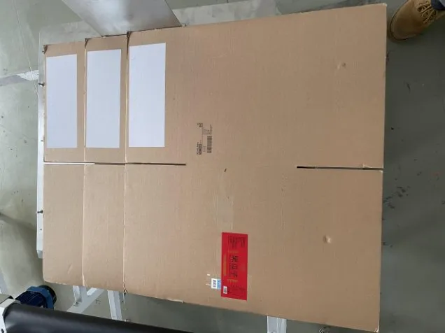 Automatic Flat Carton Labeling Machine — Unfolded cartons with labels