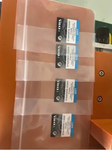 Semi-Automatic High-Precision Labeling Machine — Clear packaging bags with labels