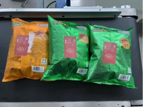 Automatic Flat Top-Surface Labeling Machine — Food pouches with labels